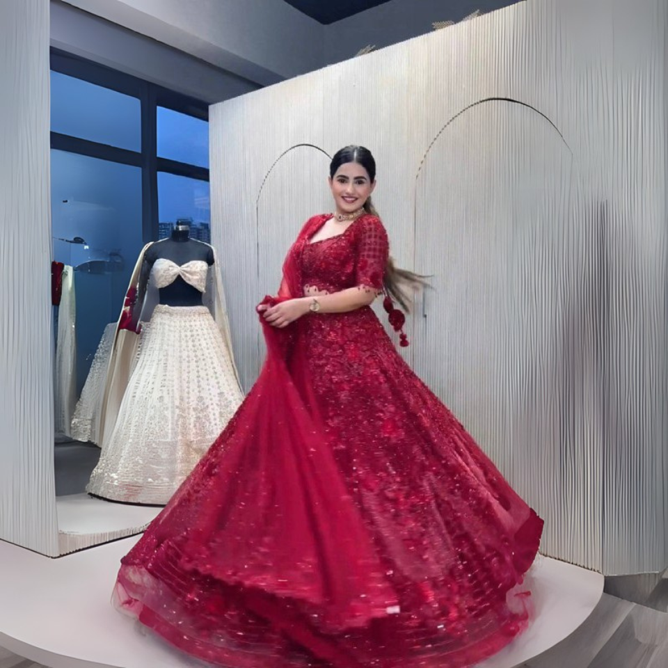 Elegant net lehenga with thread, dori, sequins & pearl bead work