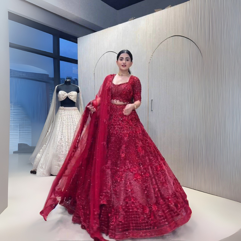 Elegant net lehenga with thread, dori, sequins & pearl bead work